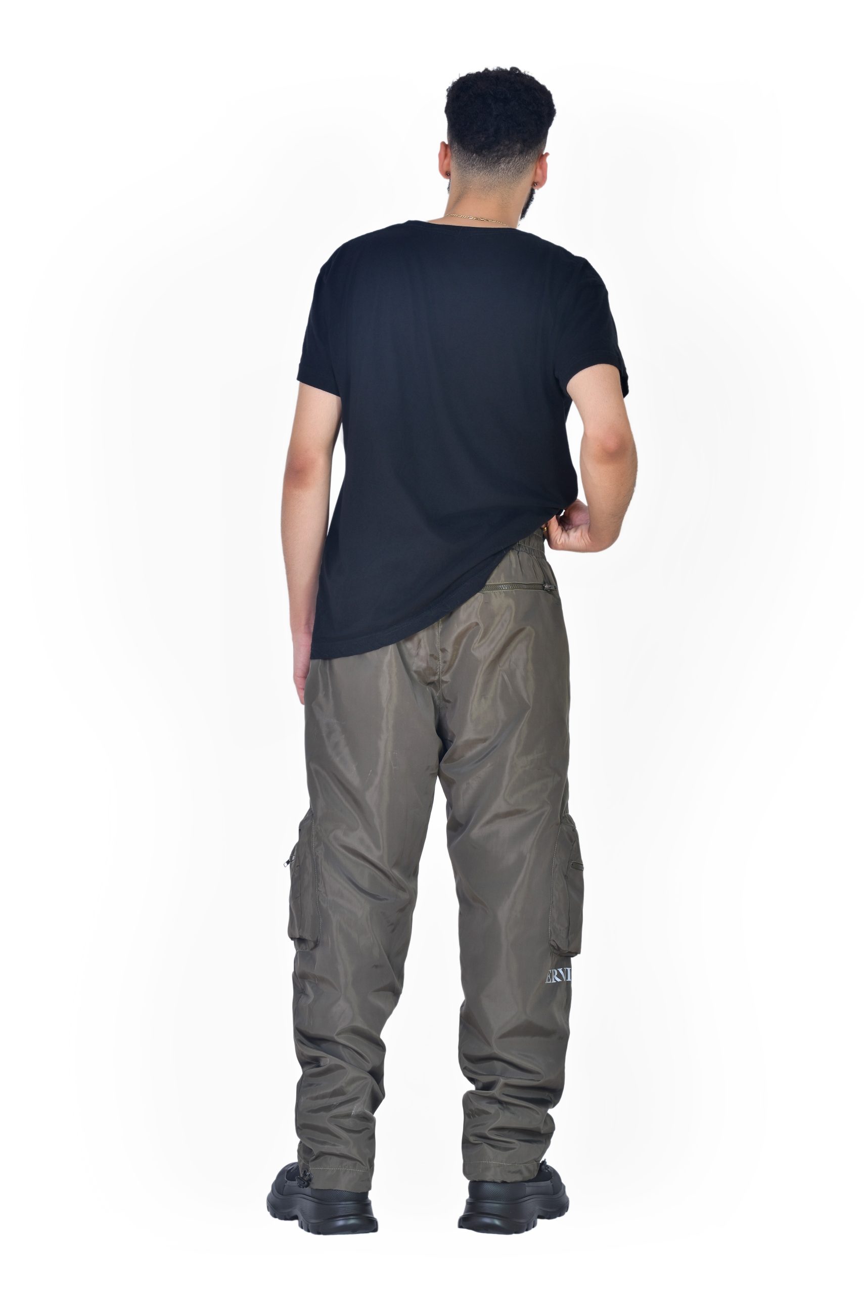 Cargo Pants for men in olive green colour, made of shell nylon fabric and adjustable waistband