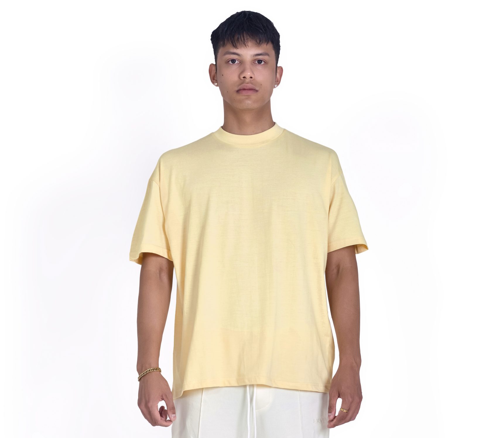 Drop shoulder t-shirt in pale yellow, 100% cotton fabric.