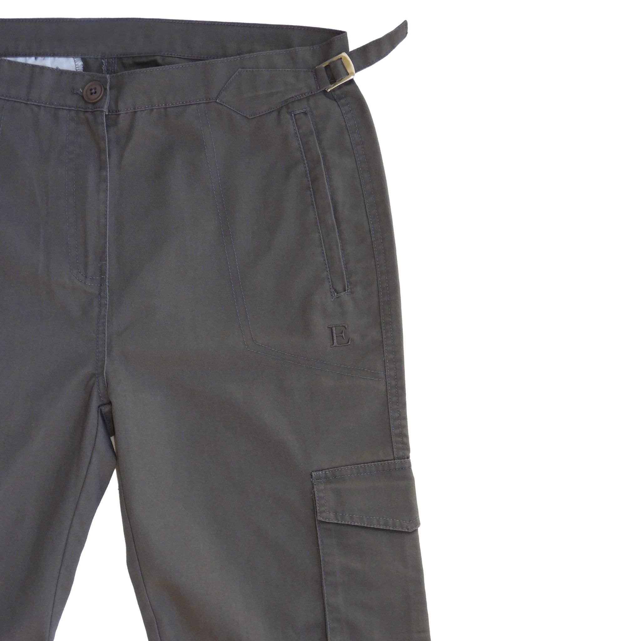 Utility cargo pants front pocket and hardware detail.